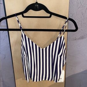 Navy blue and white striped crop top.